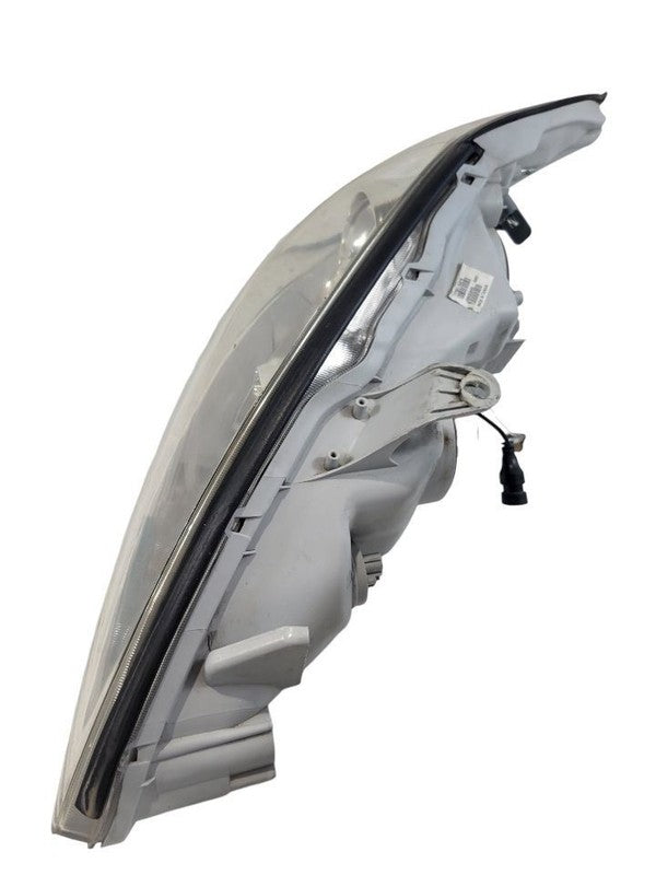 Passenger Headlight North America Built Le Chrome Trim Fits 05-06 CAMR