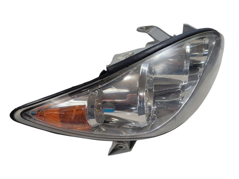 Passenger Headlight North America Built Le Chrome Trim Fits 05-06 CAMR