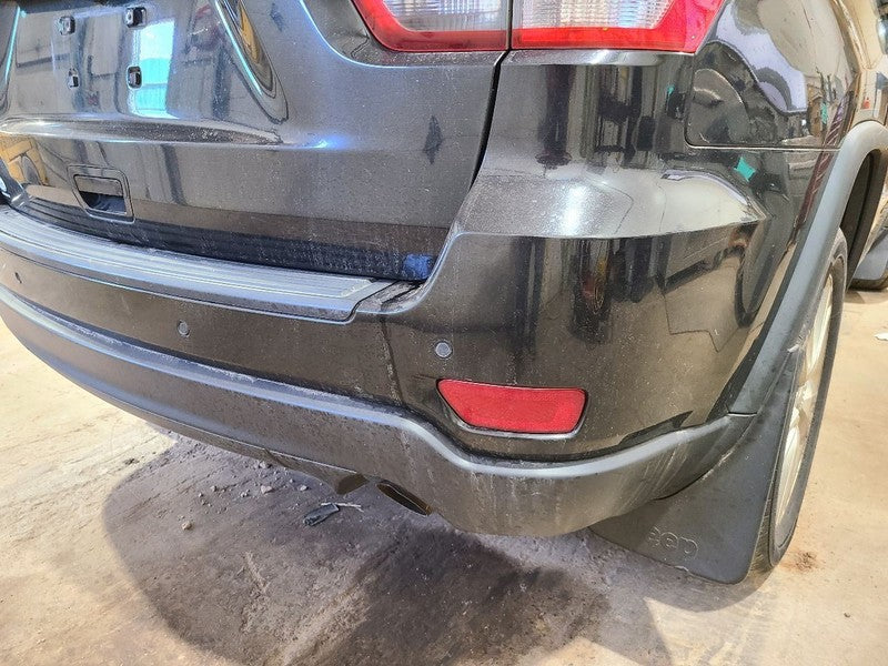 Rear Bumper Single Exhaust With Park Assist Fits 11-13 GRAND CHEROKEE 