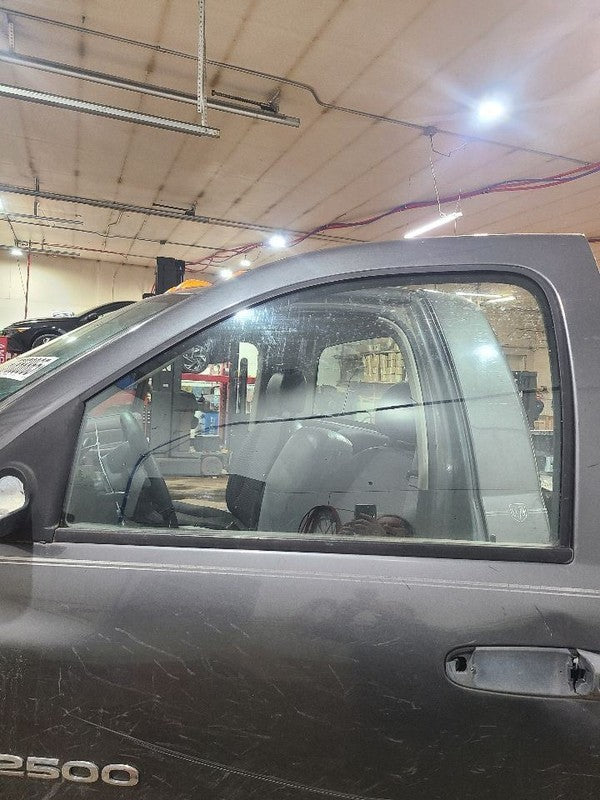 RAM2500   2004 Front Door Glass 653757